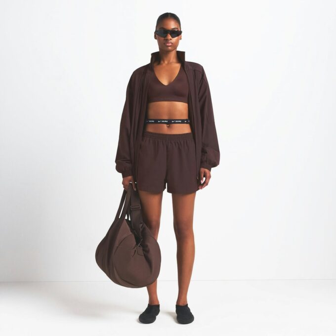 NikeSKIMS WOVEN NYLON 5″ TRACK SHORT