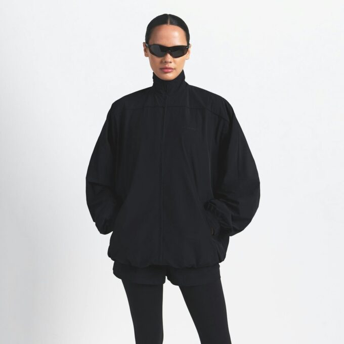 NikeSKIMS WOVEN NYLON OVERSIZED TRACK JACKET NikeSKIMS WOVEN NYLON OVERSIZED TRACK JACKET