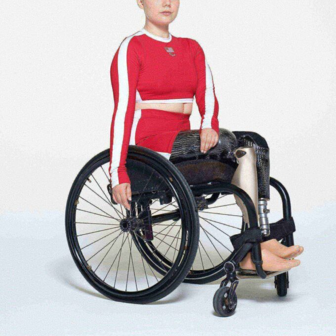 SKIMS FOR TEAM USA SIGNATURE SWIM PARALYMPIC LONG SLEEVE CROPPED T-SHIRT SKIMS FOR TEAM USA SIGNATURE SWIM PARALYMPIC LONG SLEEVE CROPPED T-SHIRT