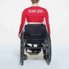 SKIMS FOR TEAM USA SIGNATURE SWIM PARALYMPIC LONG SLEEVE CROPPED T-SHIRT SKIMS FOR TEAM USA SIGNATURE SWIM PARALYMPIC LONG SLEEVE CROPPED T-SHIRT