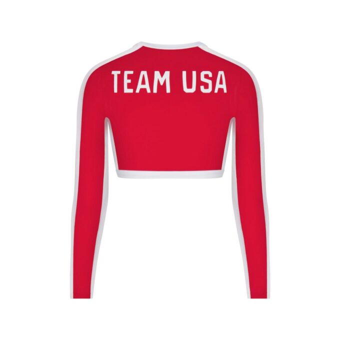 SKIMS FOR TEAM USA SIGNATURE SWIM PARALYMPIC LONG SLEEVE CROPPED T-SHIRT SKIMS FOR TEAM USA SIGNATURE SWIM PARALYMPIC LONG SLEEVE CROPPED T-SHIRT