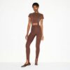 THE ESSENTIAL COLLECTION HIGH-WAISTED STIRRUP LEGGING THE ESSENTIAL COLLECTION HIGH-WAISTED STIRRUP LEGGING